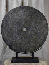 Large mounted stone disc from Papua New Guinea
