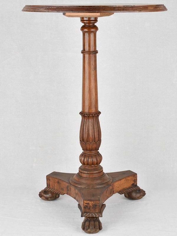 19th century French round side table with lion's paw feet