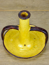 1930's Etienne Noel ceramic candlestick with yellow and brown glaze