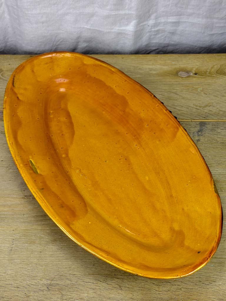 Very large ceramic platter with ochre glaze - Cliousclat Drome 1960's 26"
