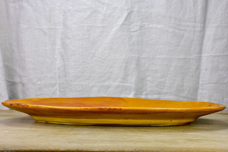 Very large ceramic platter with ochre glaze - Cliousclat Drome 1960's 26"