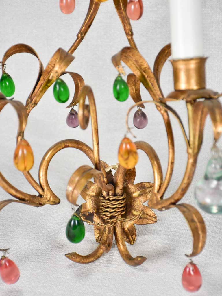 Three gold 1950s wall sconces with colorful glass fruits and pendants 13¾"