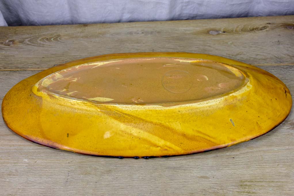 Very large ceramic platter with ochre glaze - Cliousclat Drome 1960's 26"