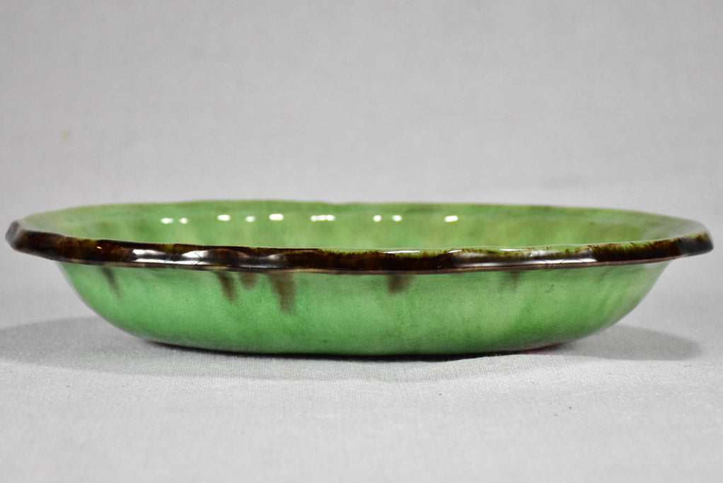 Antique French oval bowl from Dieulefit with green glaze 11"