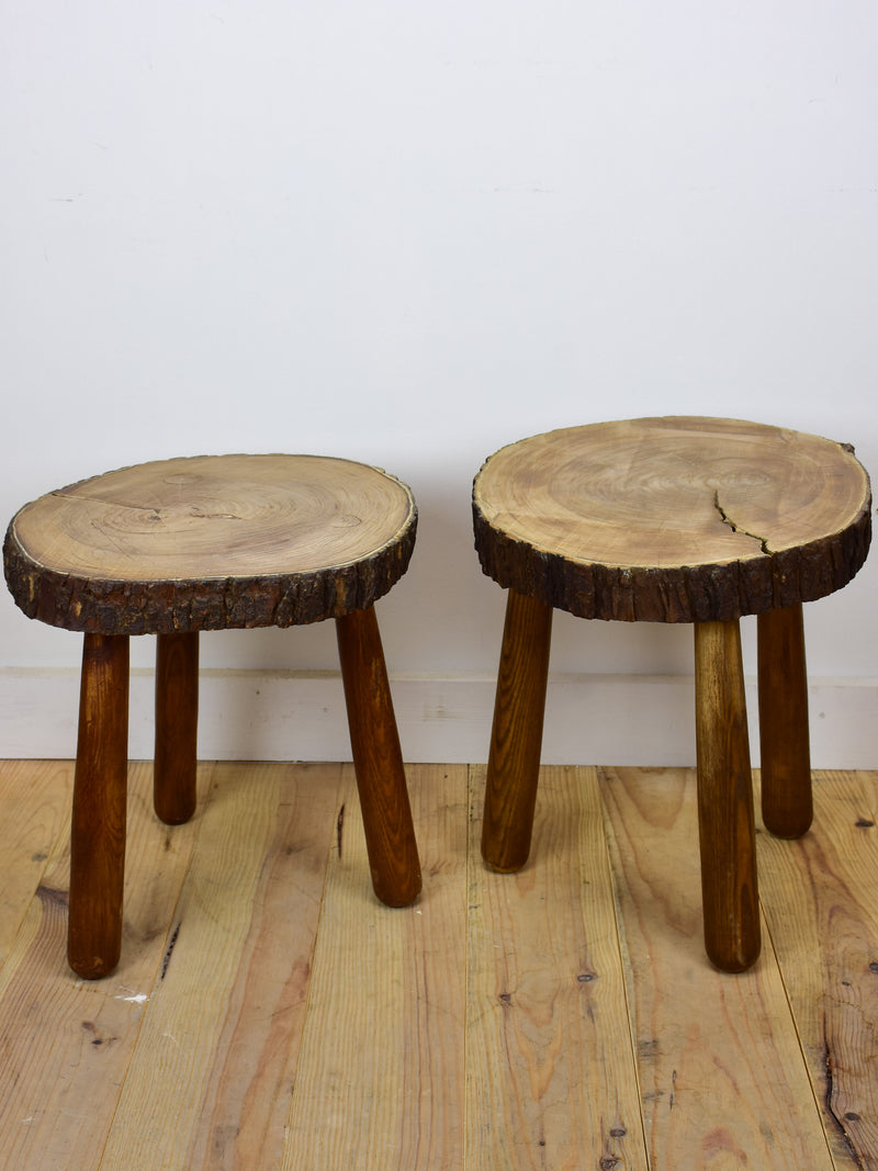 Two vintage French elmwood stools / side tables