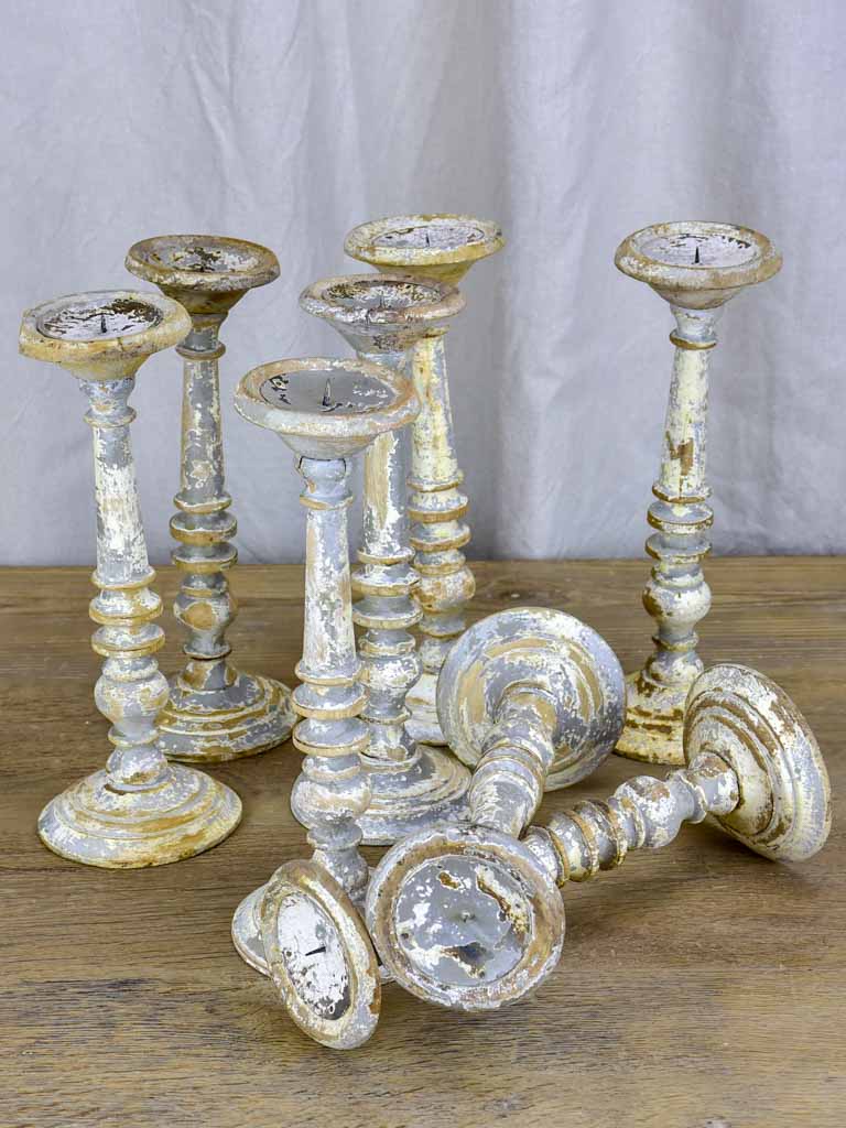 Collection of four rustic vintage candlesticks