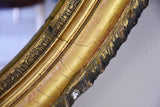 Large oval Louis XVI style mirror