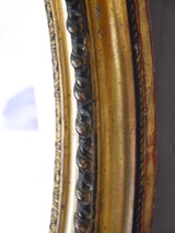 Large oval Louis XVI style mirror