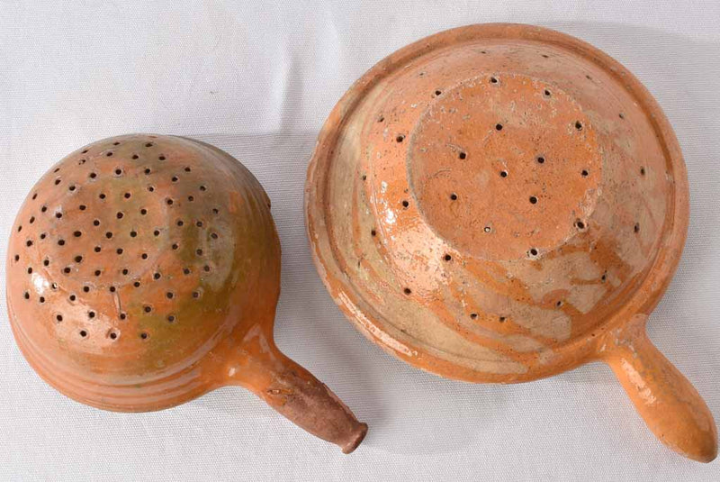 2 antique French terracotta strainers w/handles