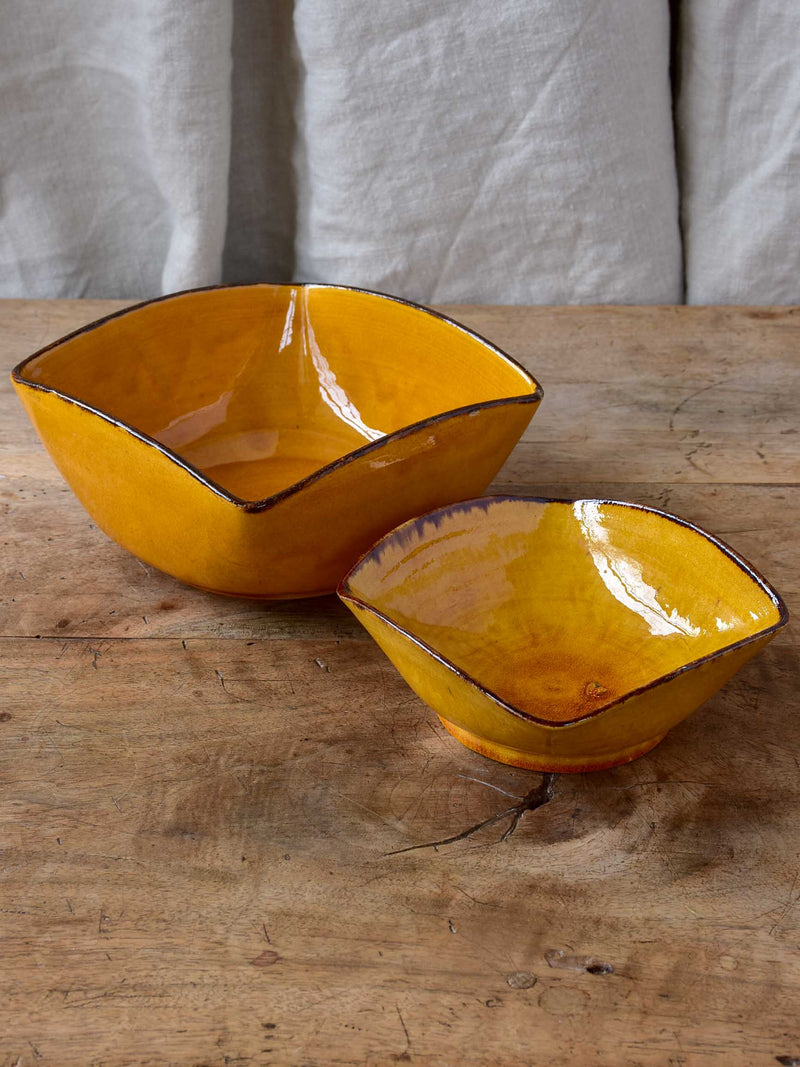 Two vintage Dieulefit bowls with ochre glaze