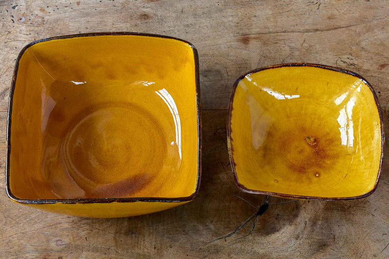 Two vintage Dieulefit bowls with ochre glaze