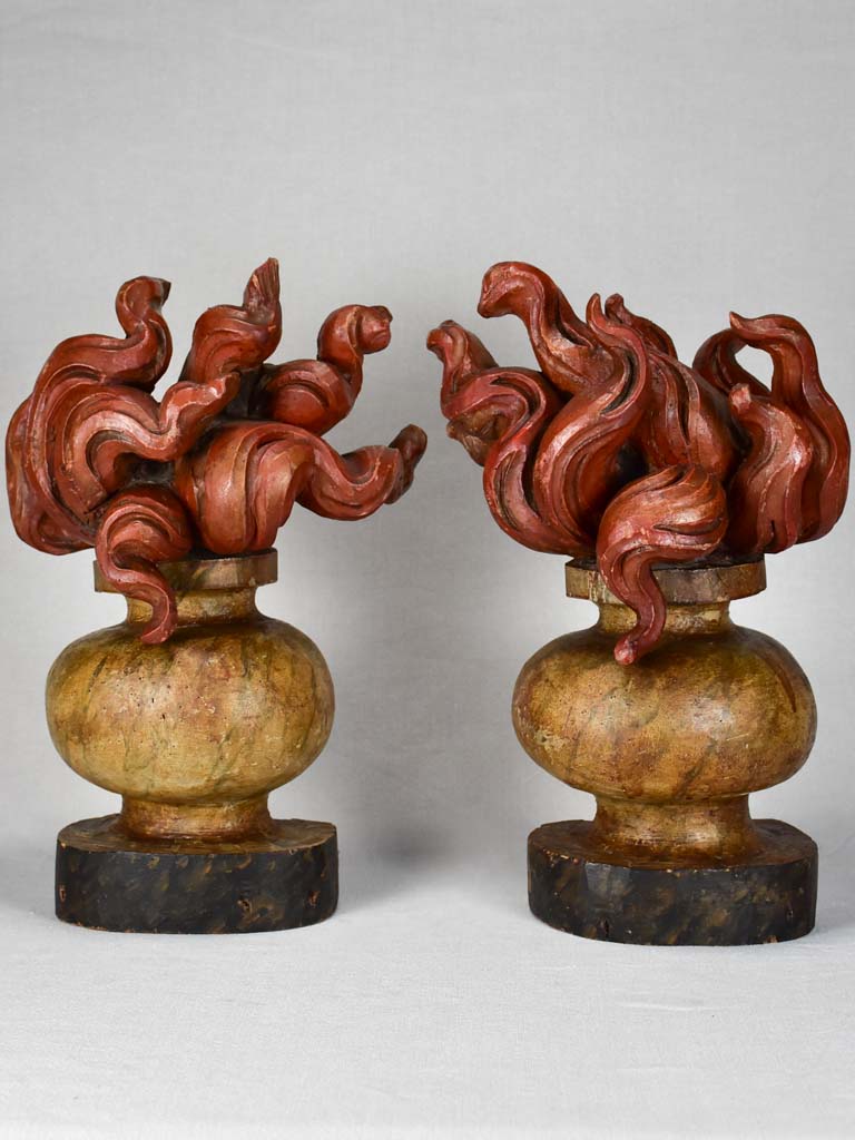Pair of Louis XIV carved wood decorative flame elements 18"