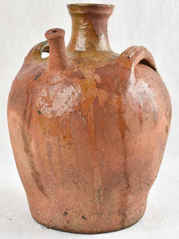 Antique French walnut oil pitcher from the Auvergne w/ brown glaze 13¾"