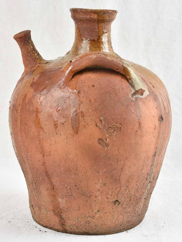 Antique French walnut oil pitcher from the Auvergne w/ brown glaze 13¾"