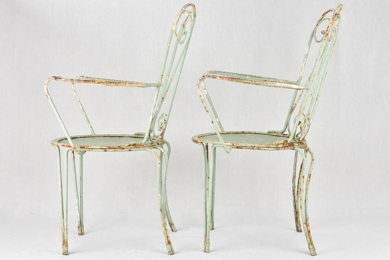 Pair of 1950s garden armchairs with green patina