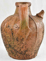 Antique French walnut oil pitcher from the Auvergne - terracotta - 15"
