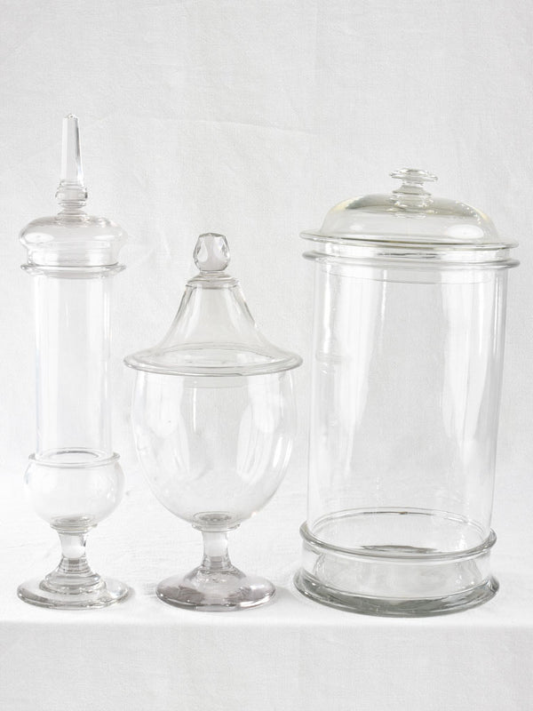 Collection of three lidded blown glass jars 19th century 21¾"