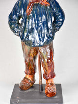 Captivating aged Bavent faience boy sculpture