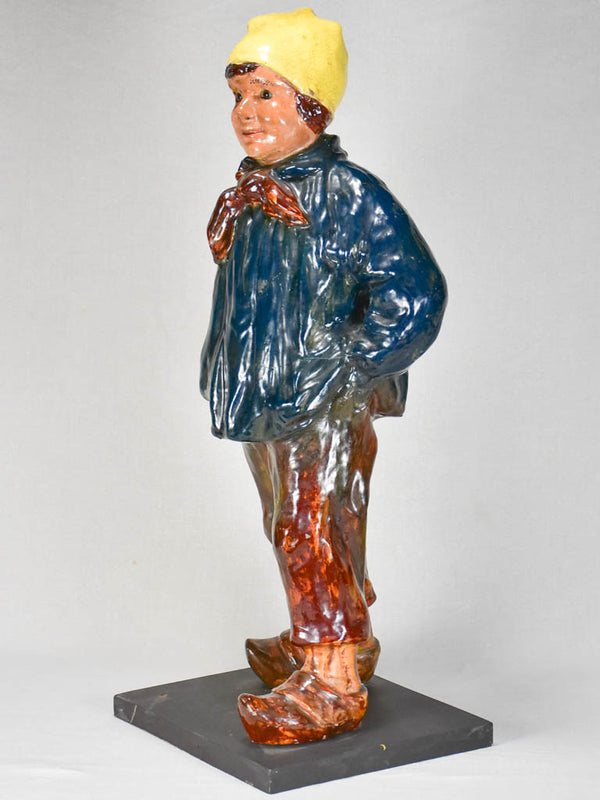 Late-19th-century sculpture of a Norman boy - Bavent faience 31"