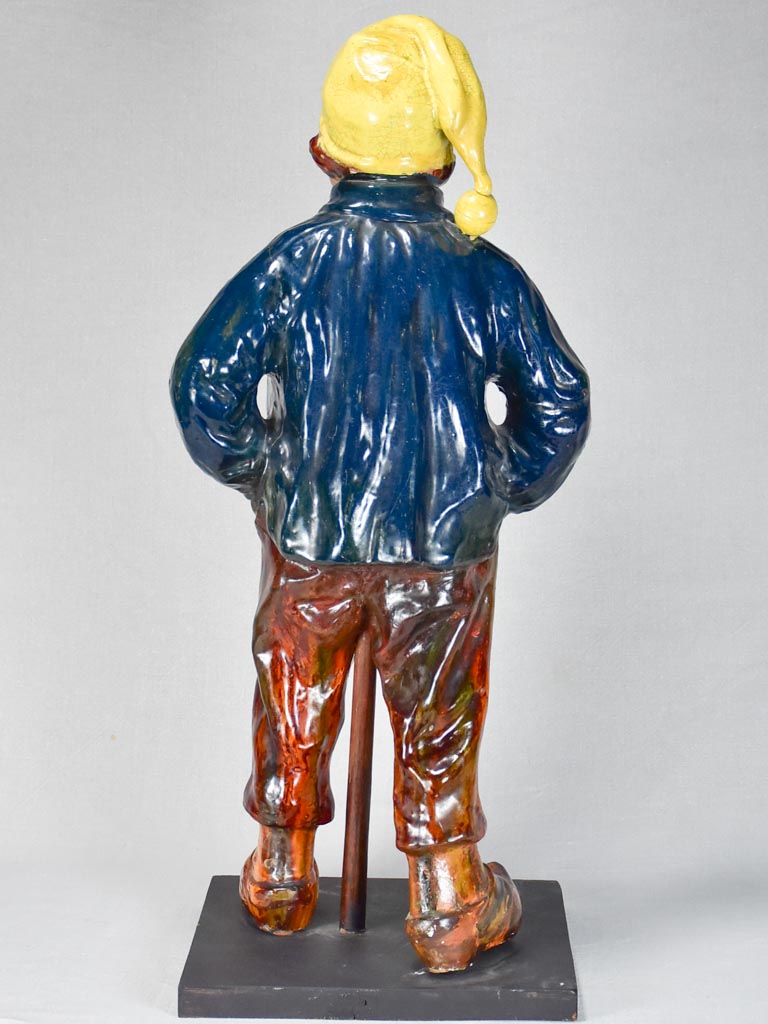 Aged Bavent faience sculpture with cracks