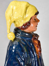 Bavent faience boy sculpture, heavily worn