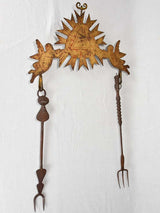 Antique tole-supported hanging cooking tools