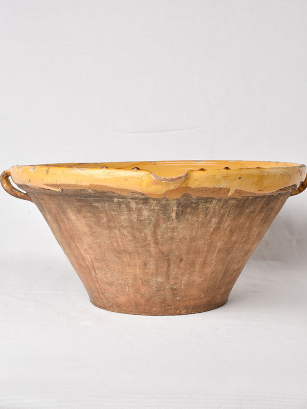 Aged yellow-ocher glazed kitchen bowl
