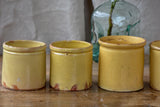 Collection of 7 antique French yellow ware pots