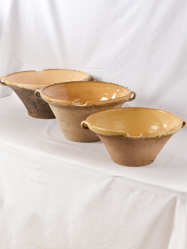 Complementary rustic earth-toned kitchenware pottery set