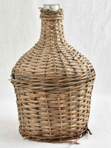 Vintage French demijohn bottle in wicker case 13¾"
