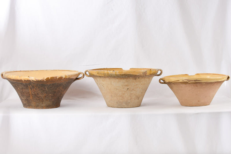 Display-oriented yellow glazed Provencal clay tians