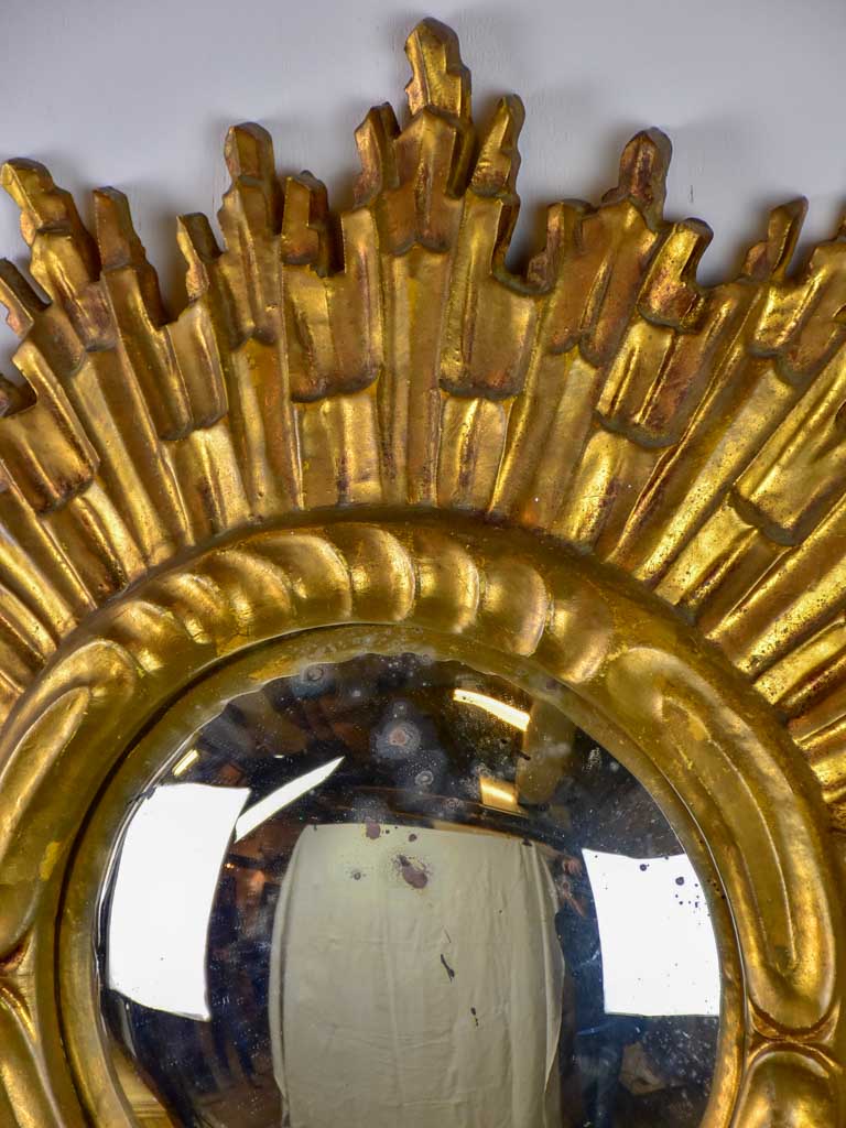 Mid century sunburst mirror with gold frame and convex mirror 23¾"