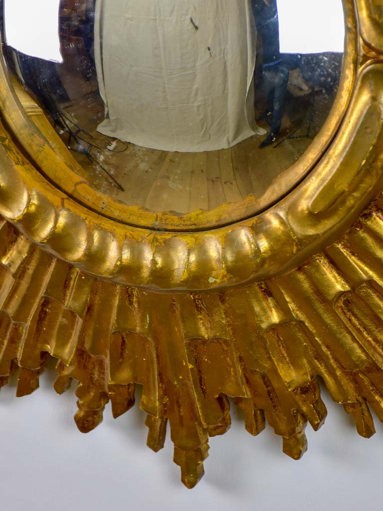 Mid century sunburst mirror with gold frame and convex mirror 23¾"