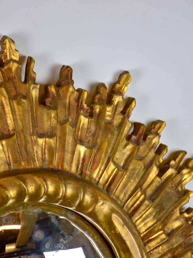 Mid century sunburst mirror with gold frame and convex mirror 23¾"