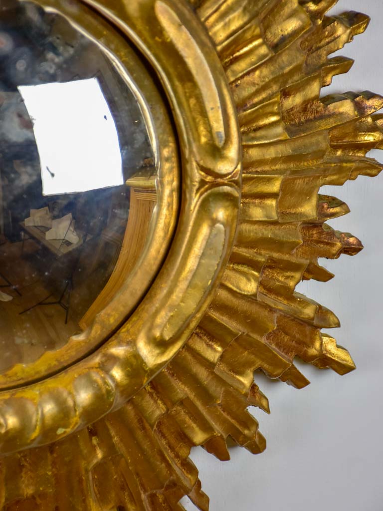 Mid century sunburst mirror with gold frame and convex mirror 23¾"