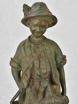 Aged Iron Figurine of Hunter Boy