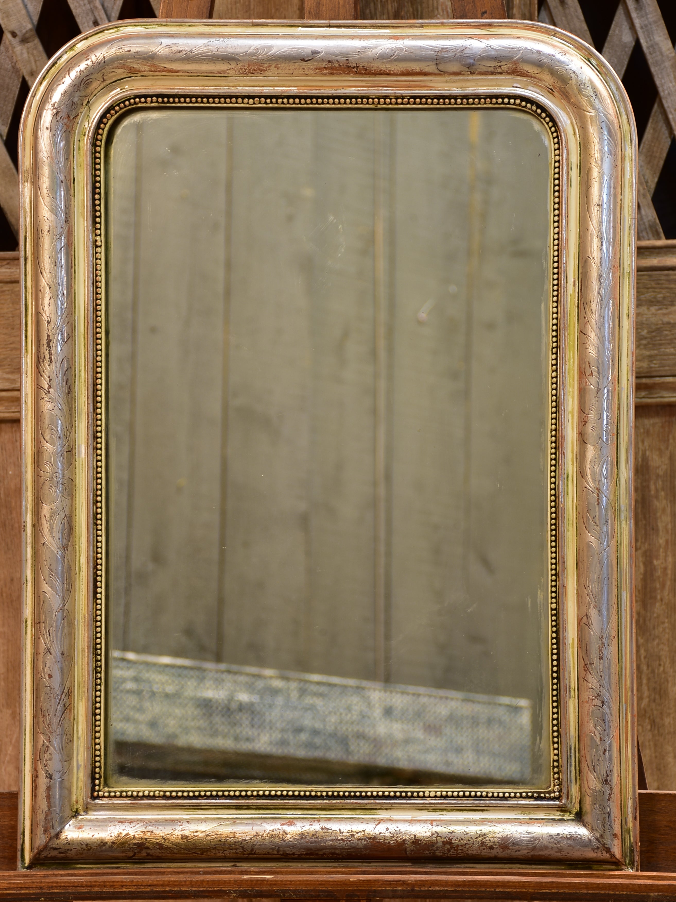 Small Louis Philippe mirror with silver frame