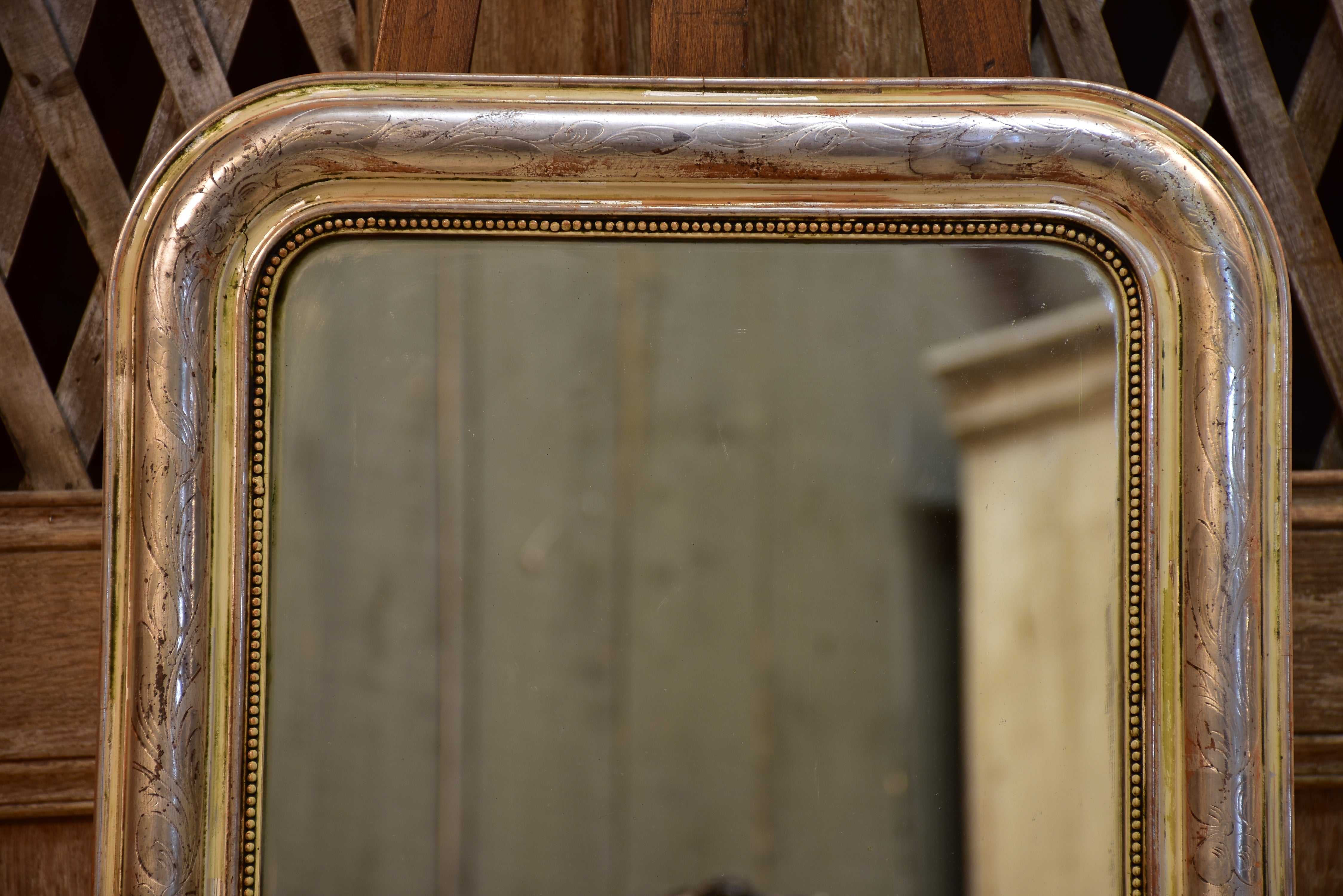 Small Louis Philippe mirror with silver frame