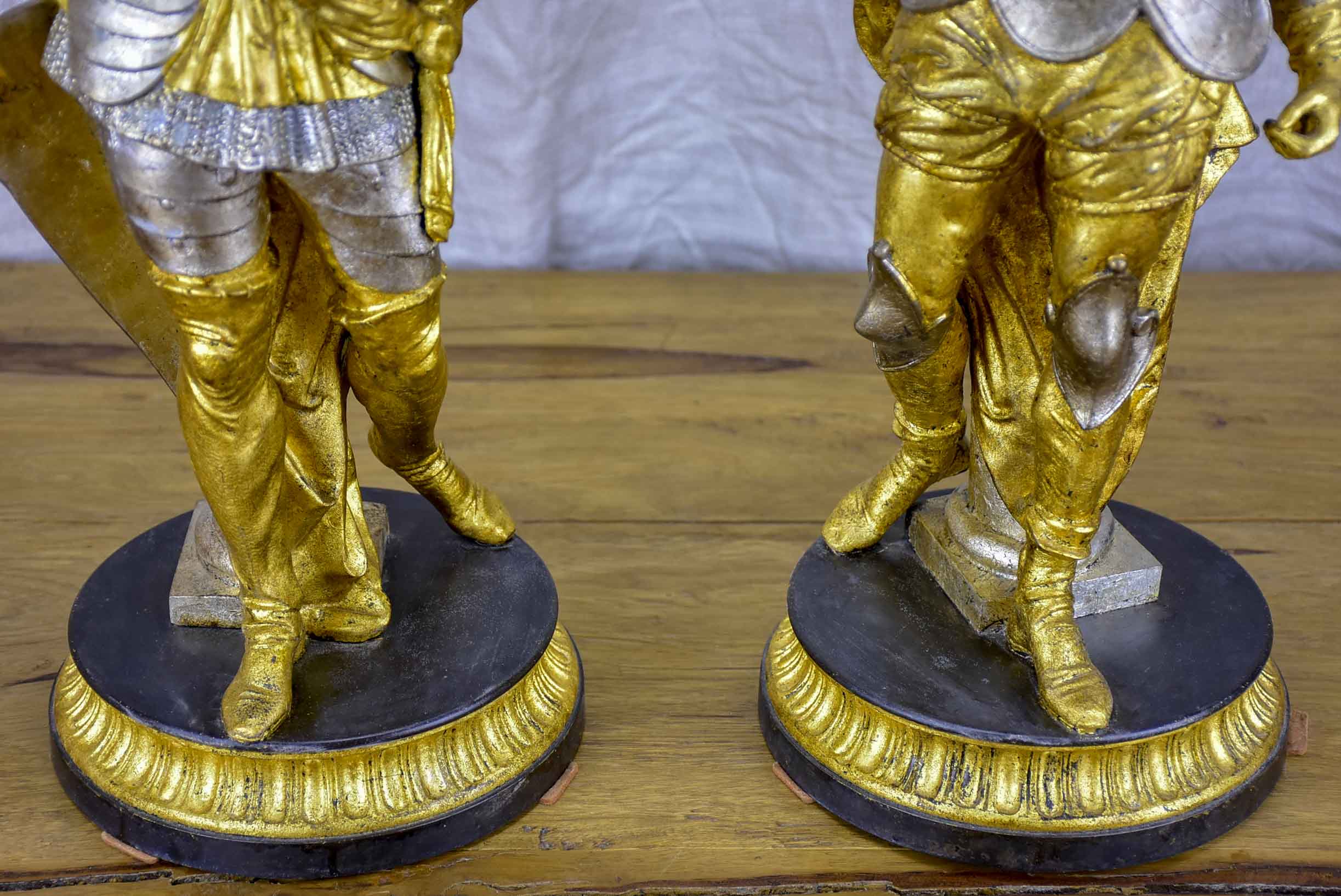 Pair of late 19th Century silver and gold statues