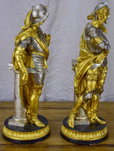 Pair of late 19th Century silver and gold statues