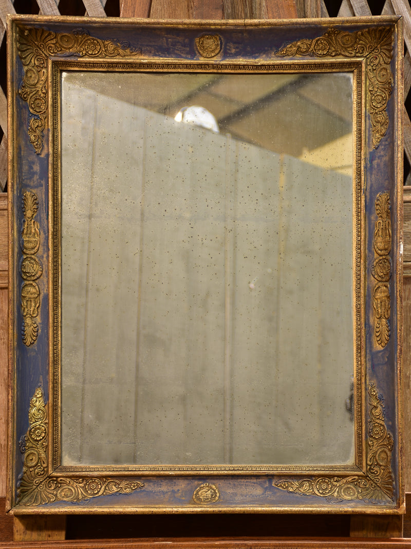 Early 19th century French restoration mirror with blue patina