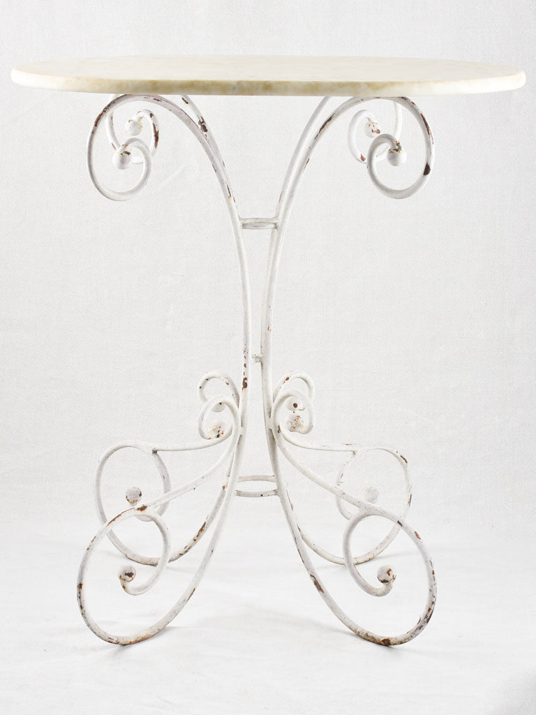 Oval marble garden table with wrought iron base 19¼" x 27½"