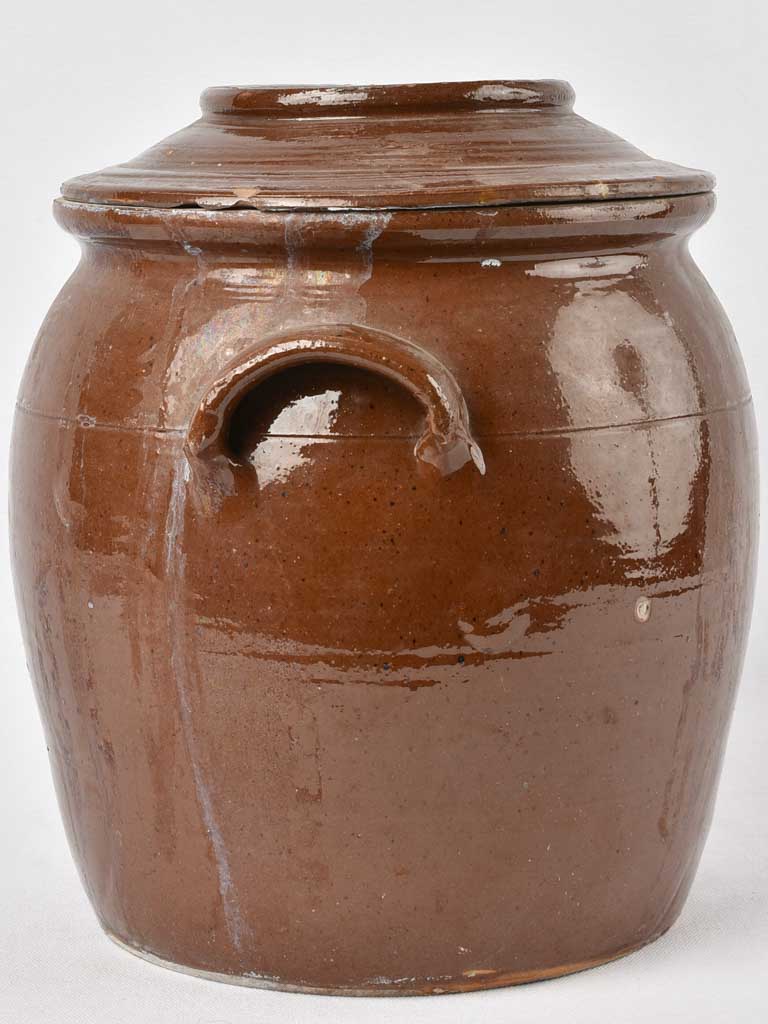 Vintage salt-marked terracotta olive crock