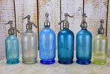 Twelve antique French seltzer bottles