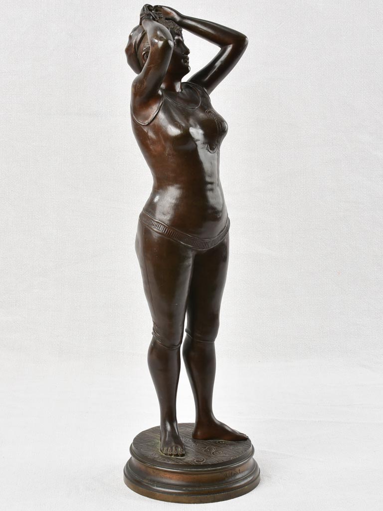 Antiquated bronze lady sculpture