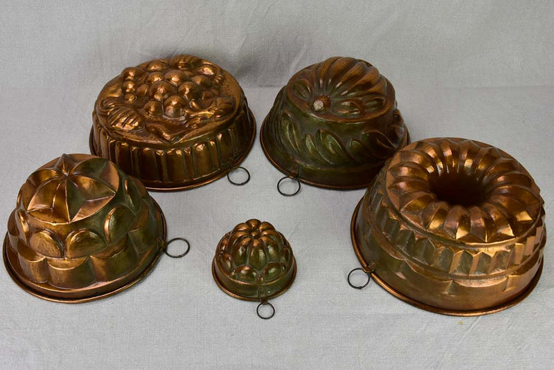 Collection of five late 18th / early 19th century copper cake molds
