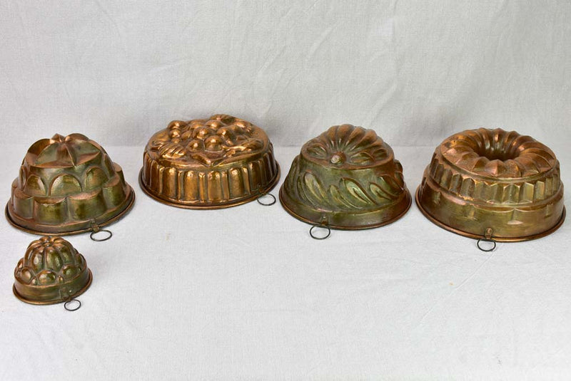 Collection of five late 18th / early 19th century copper cake molds