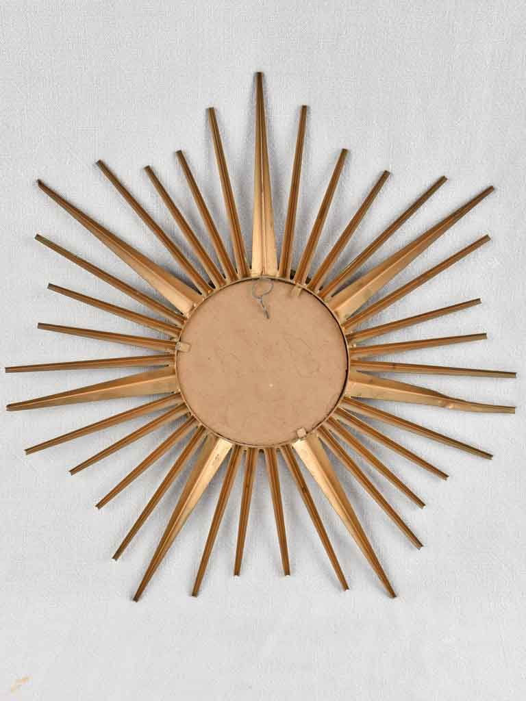 Small gold 1950s Chaty Vallauris mirror 20"