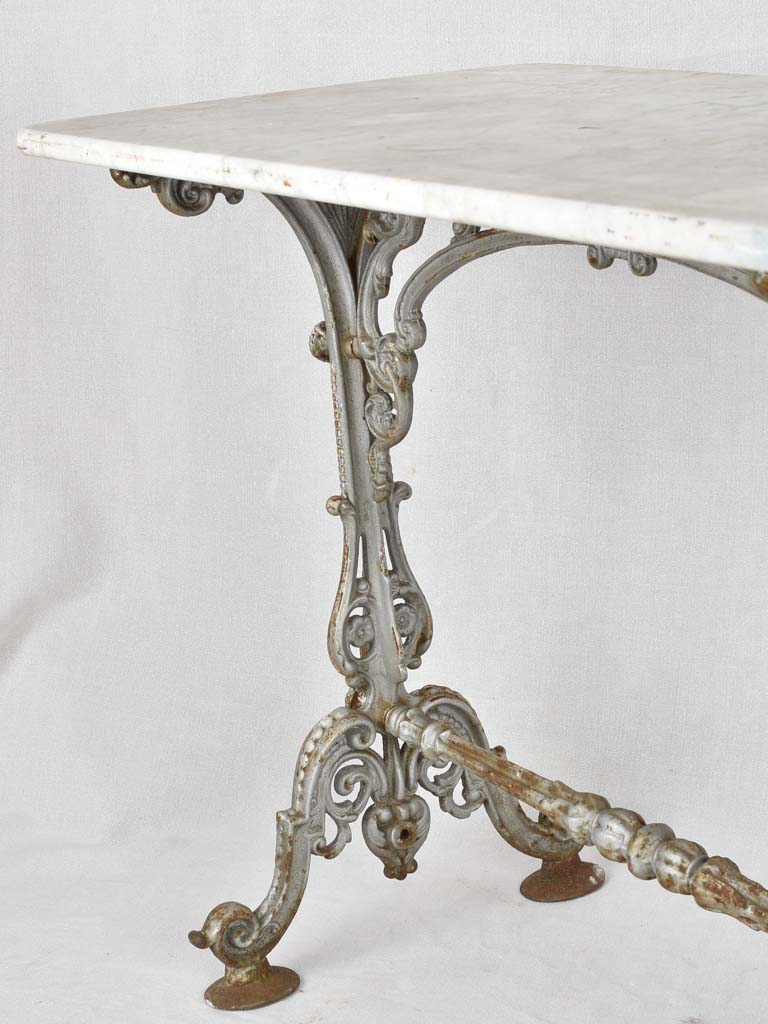 Rectangular marble and cast iron bistro table 35½