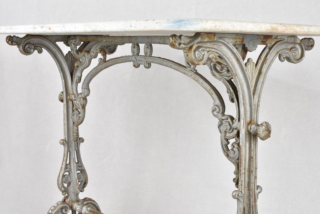 Rectangular marble and cast iron bistro table 35½